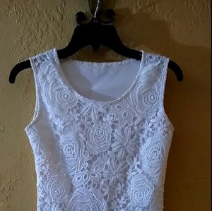 White elegant, embroided, medium blouse.